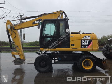Pelle sur pneus Caterpillar