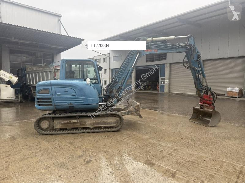 جرافة Takeuchi Powertilt