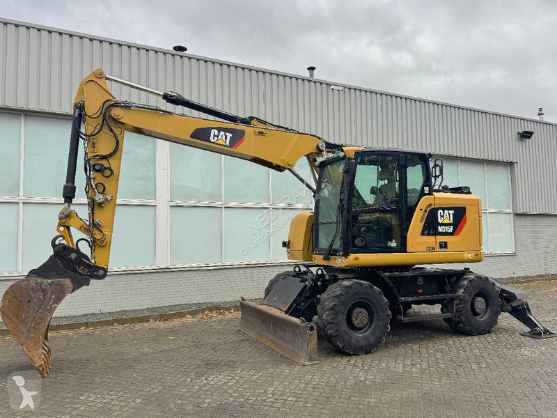 Багер Caterpillar F 2017