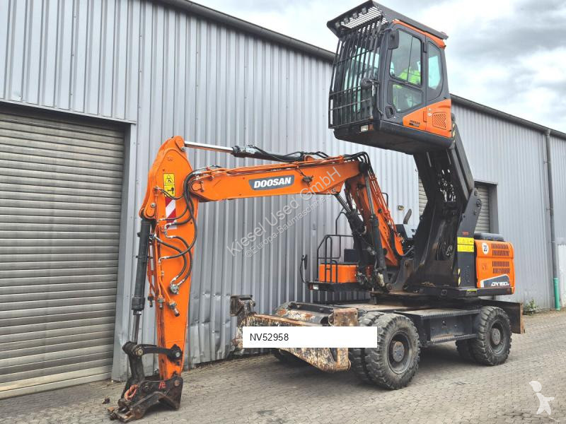 Багер Doosan 5