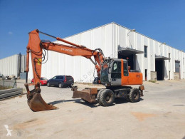 /1/2/7799047-excavadora_de_ruedas-hitachi_th.jpg