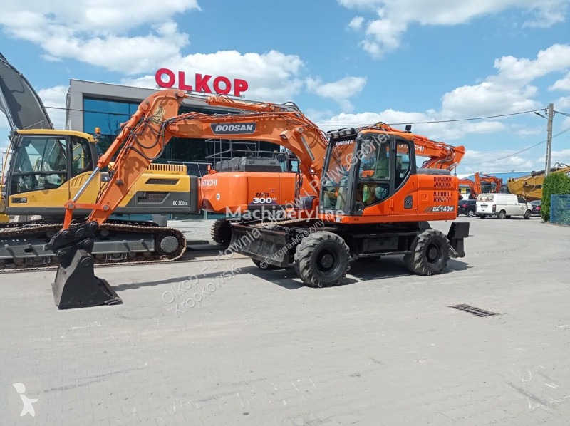 Lopatový nakládač Doosan DX140 W-3 Z SYSTEMEM...
