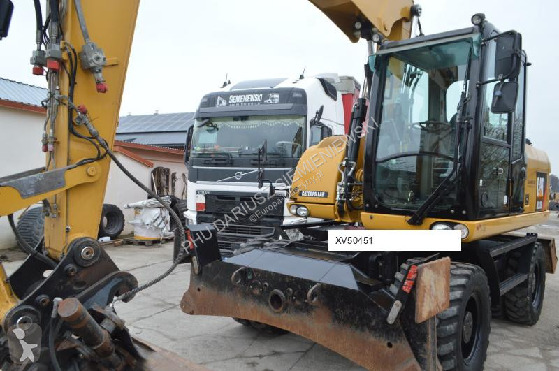 Lopatový nakládač Caterpillar 313