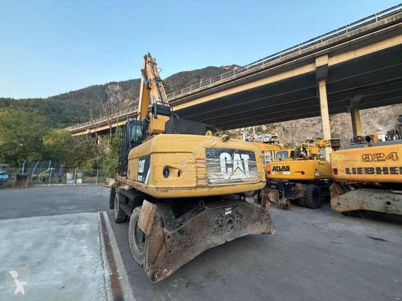 Skovel Caterpillar DMH