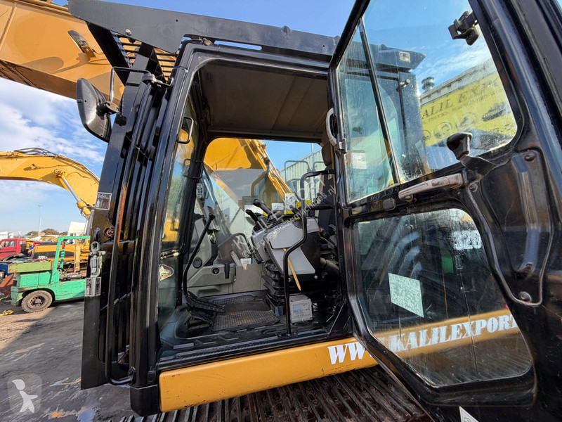 Экскаватор Caterpillar E L Track Excavator -...