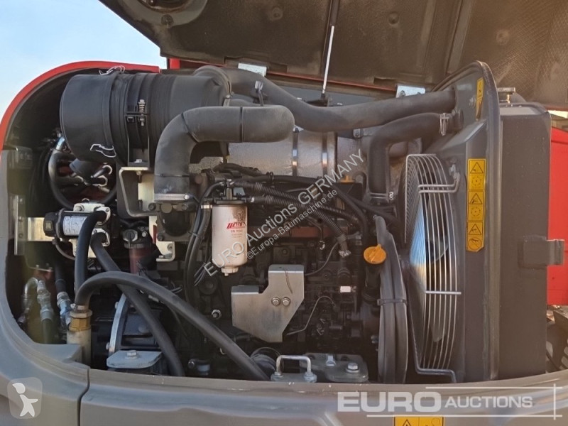 جرافة Wacker Neuson 2