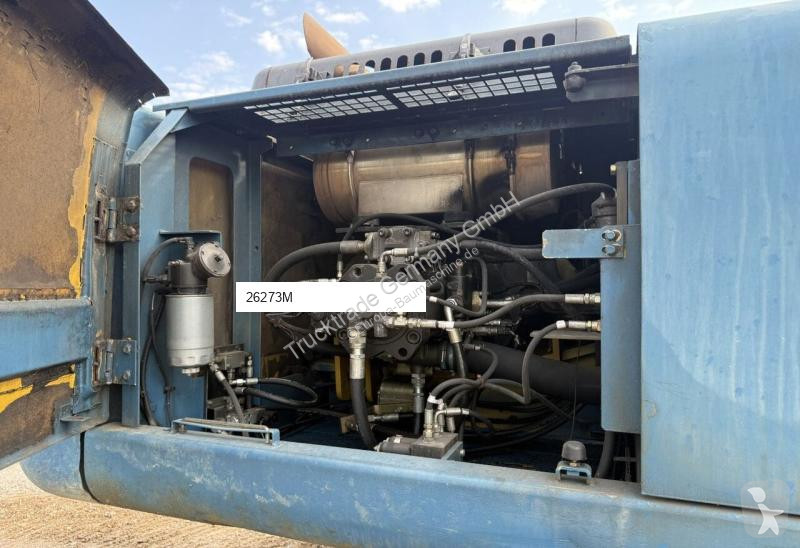 Багер New Holland Bagger / Swiss-Vehicle