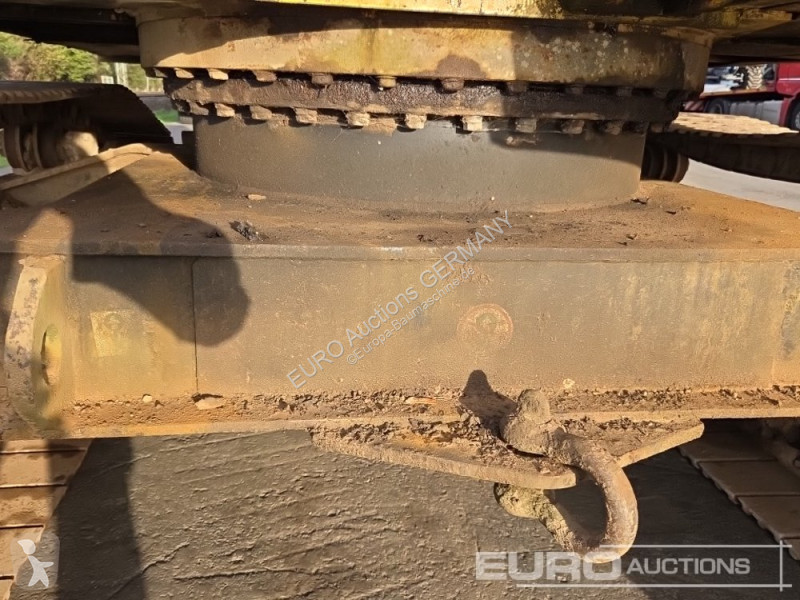 Багер Caterpillar 215C