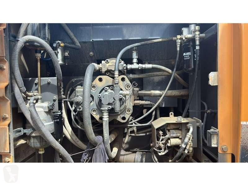 Escavadora Case