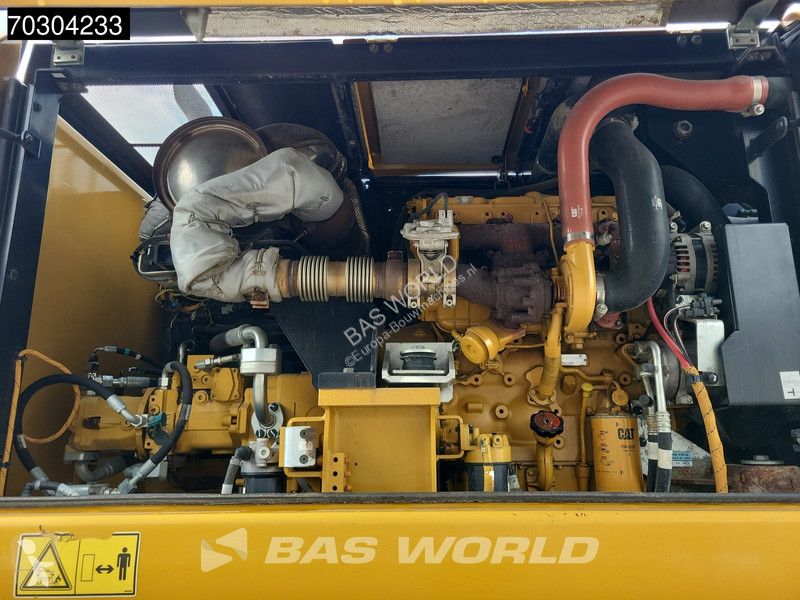 جرافة Caterpillar F F Outrigger + Blade
