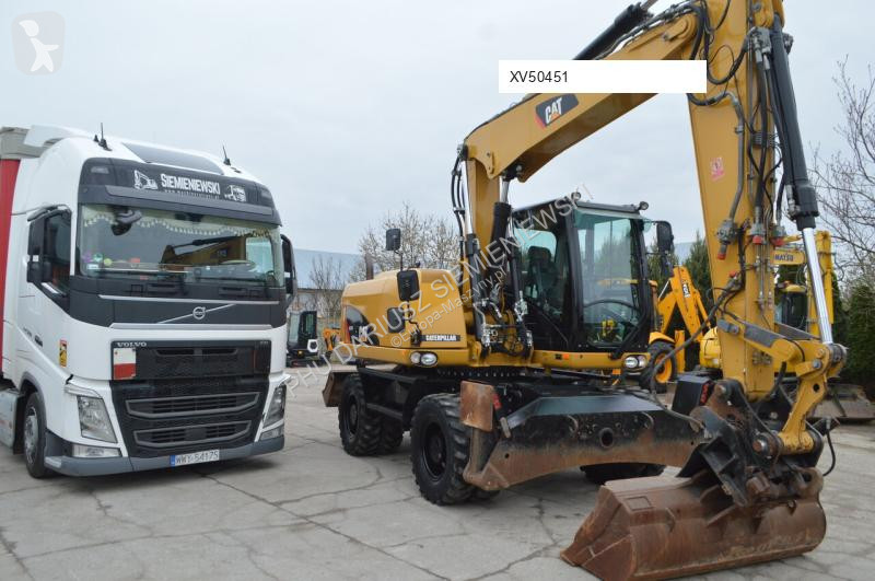 Lopatový nakládač Caterpillar 313