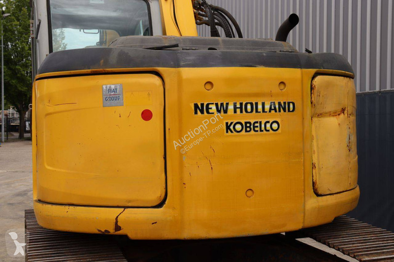 Багер New Holland Kobelco 2