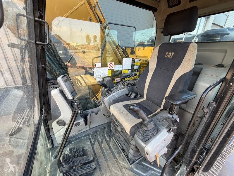 Багер Caterpillar 320FL