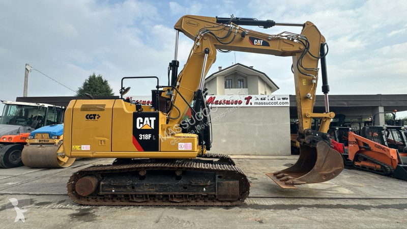 Багер Caterpillar 318FL