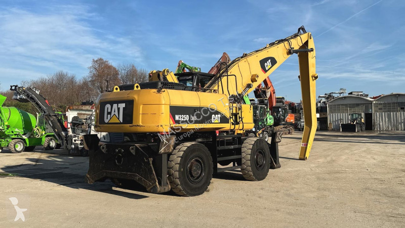 Rýpadlo Caterpillar M 4X4