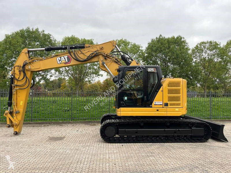 Rýpadlo Caterpillar 325 with dozerblade 1085...