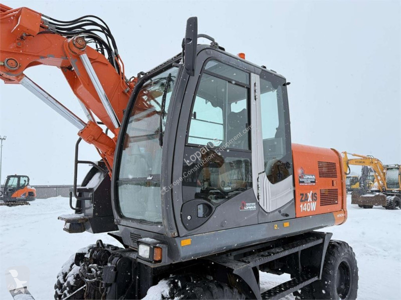 Экскаватор Hitachi 140 W