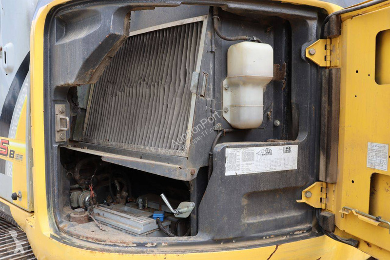 Багер New Holland Kobelco 2