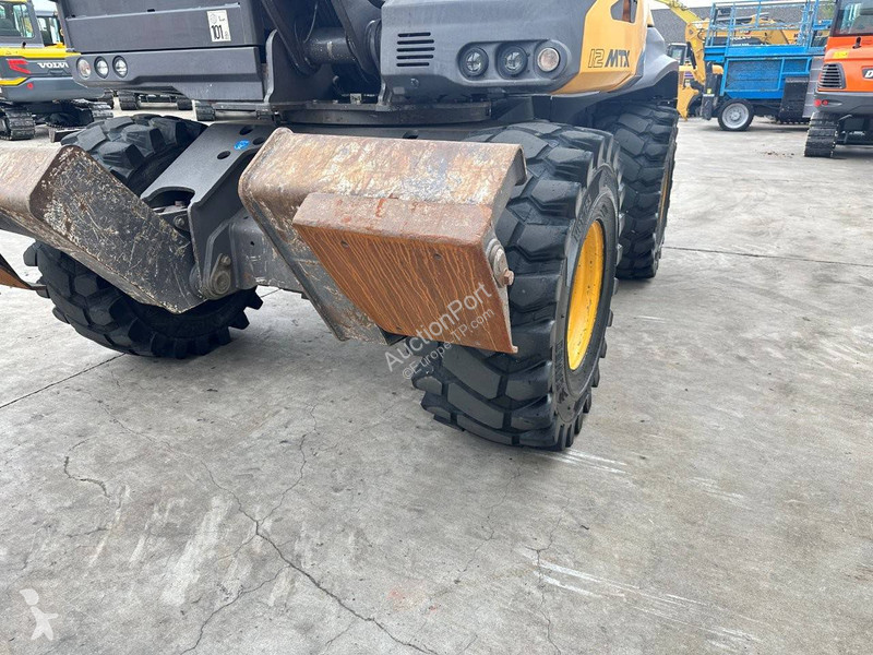 Экскаватор Mecalac