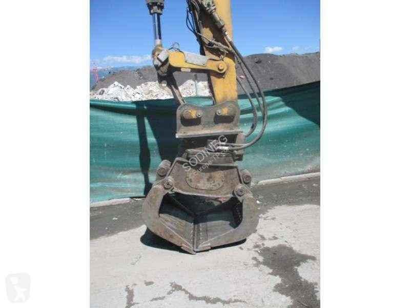 Багер Caterpillar MH