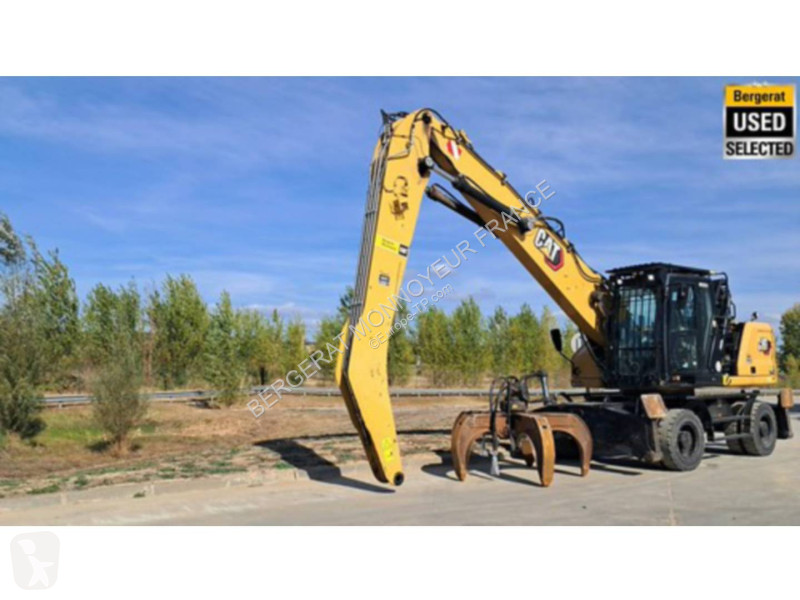 Pelle Caterpillar MH3024