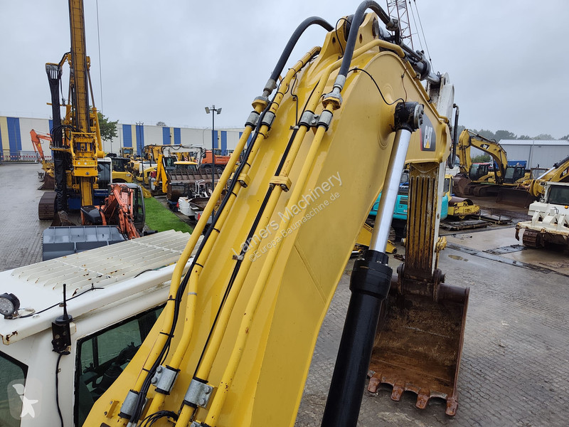 Багер Caterpillar 374F D .