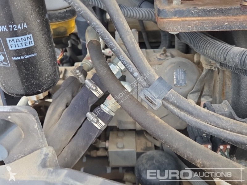 Багер Volvo EW60E