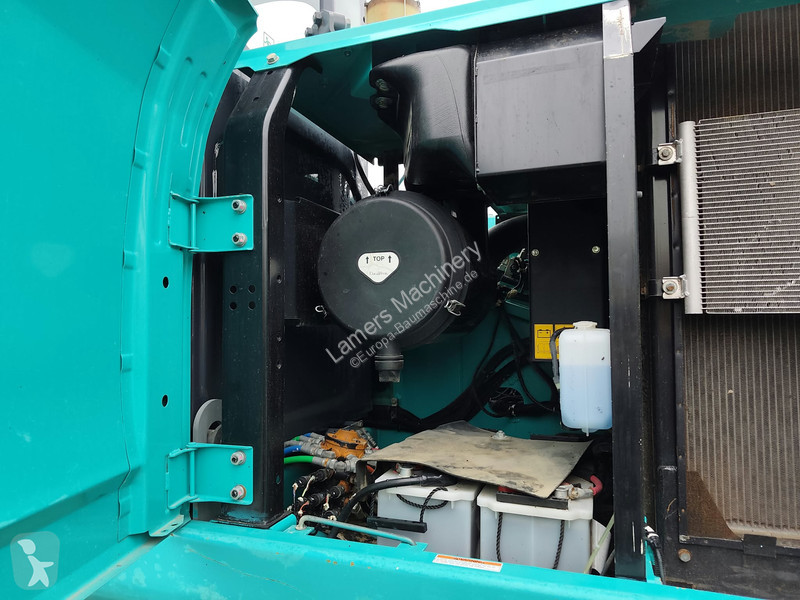 جرافة Kobelco SK350 NLC-9 .