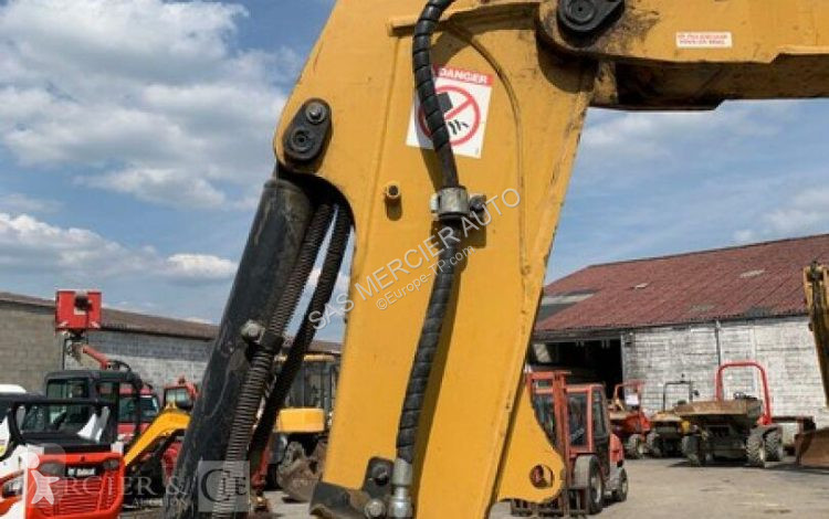 Skovl Caterpillar minipelle sur chenilles diesel