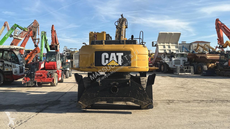 Rýpadlo Caterpillar M 4X4