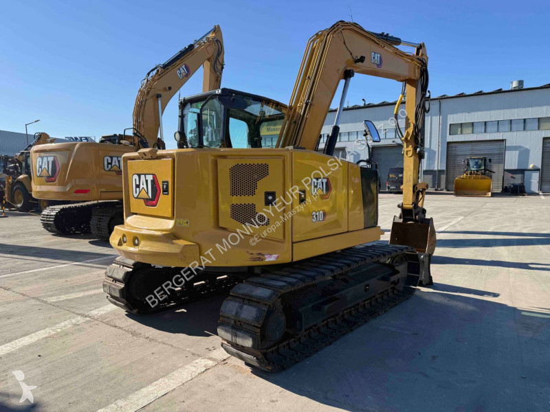 Экскаватор Caterpillar 310