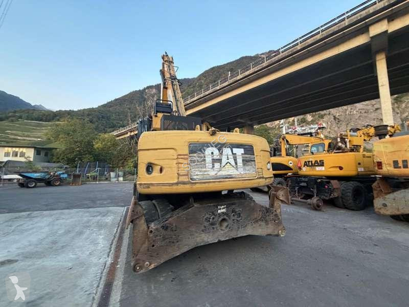 Skovel Caterpillar DMH