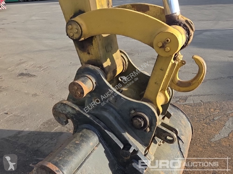 Багер Caterpillar 215C