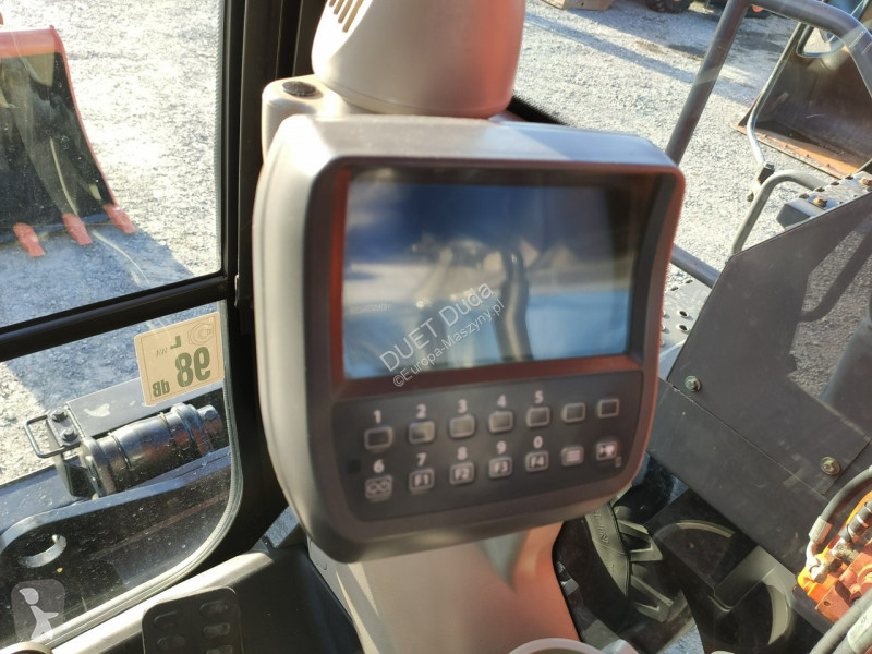 Escavatore Hitachi ZX140 Koparka Kołowa