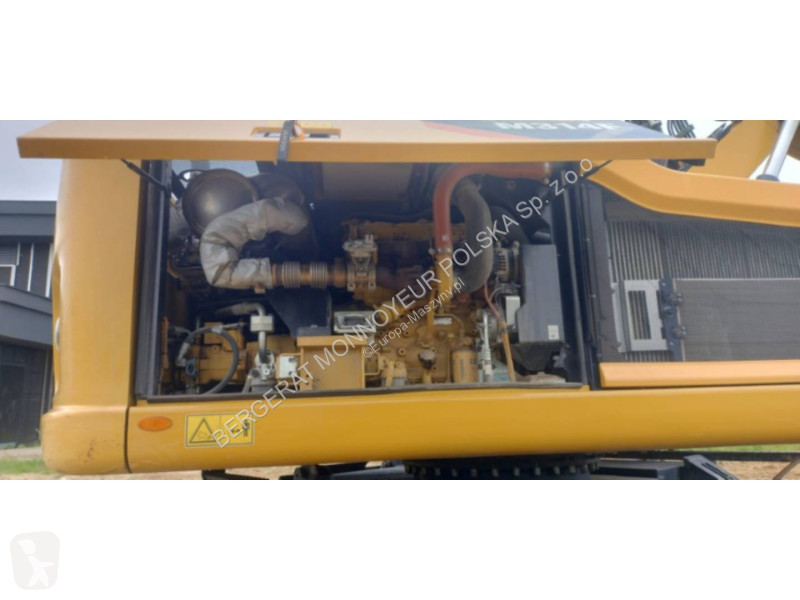 Багер Caterpillar M314F