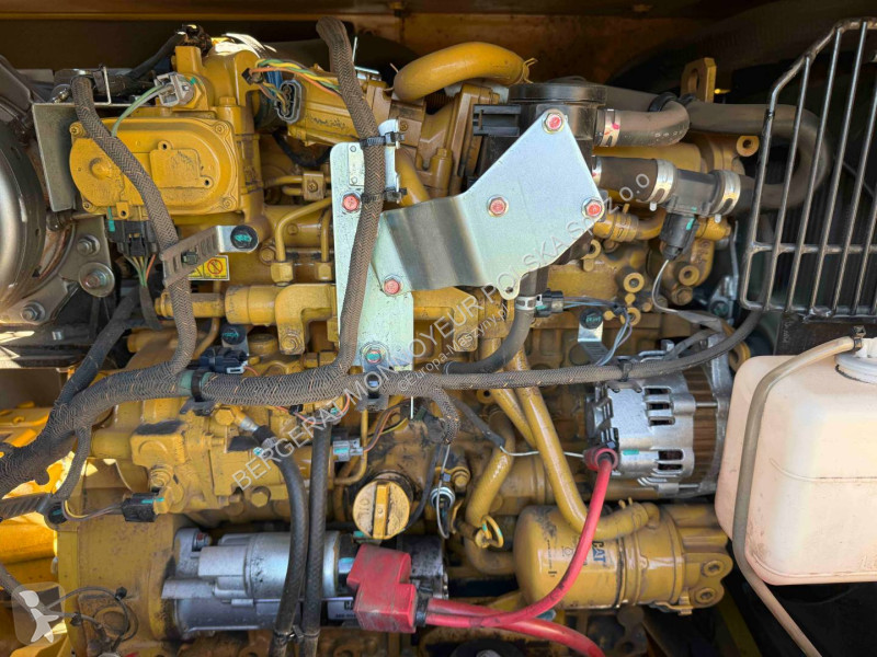 Экскаватор Caterpillar 310
