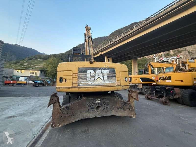 Skovel Caterpillar DMH