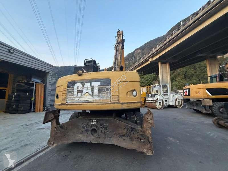 Skovel Caterpillar DMH