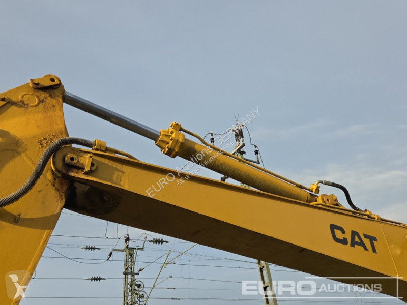Багер Caterpillar 215C
