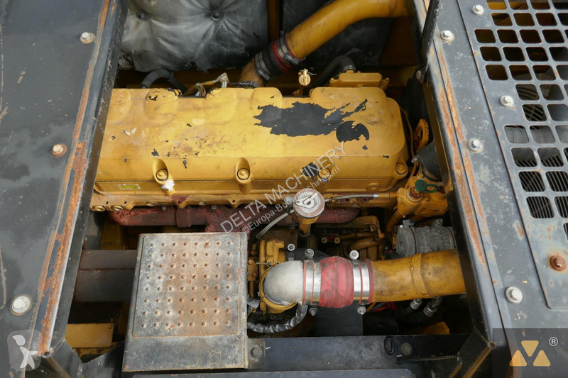 Багер Caterpillar LME