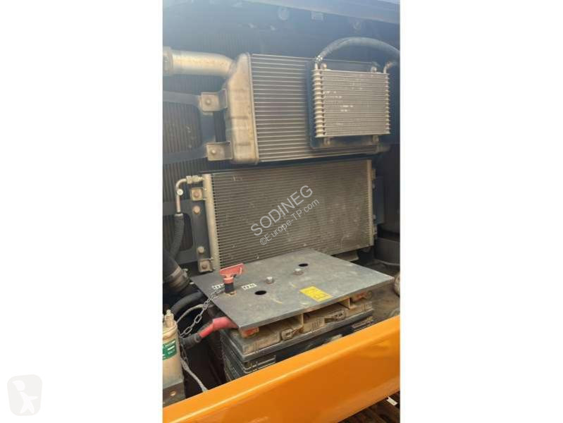 Escavadora Case