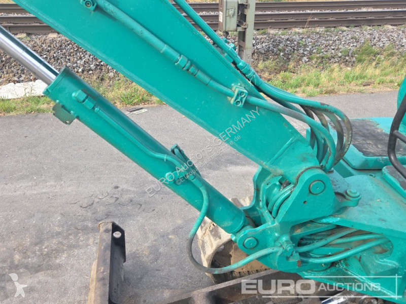 Багер Komatsu PC25-1