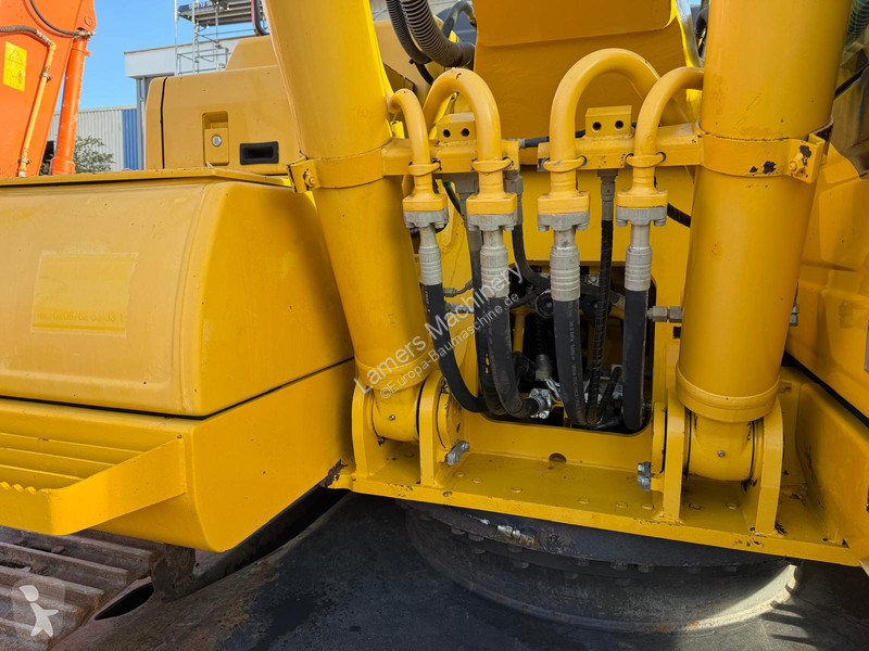 Багер Komatsu PC 210-11 .