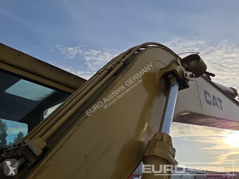 Багер Caterpillar 215C