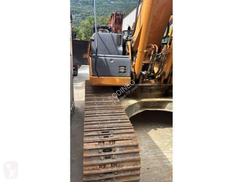 Escavadora Case