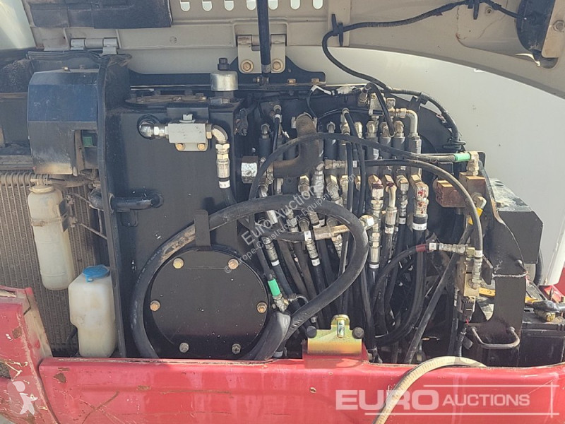 Escavadora Takeuchi 0