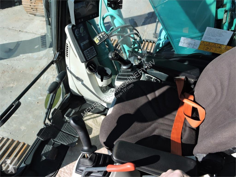جرافة Kobelco SK210