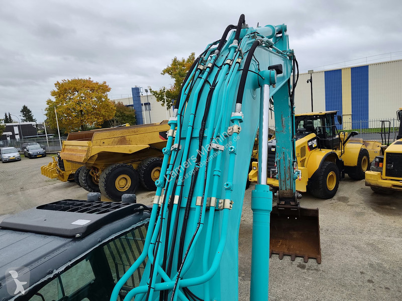 جرافة Kobelco SK350 NLC-9 .