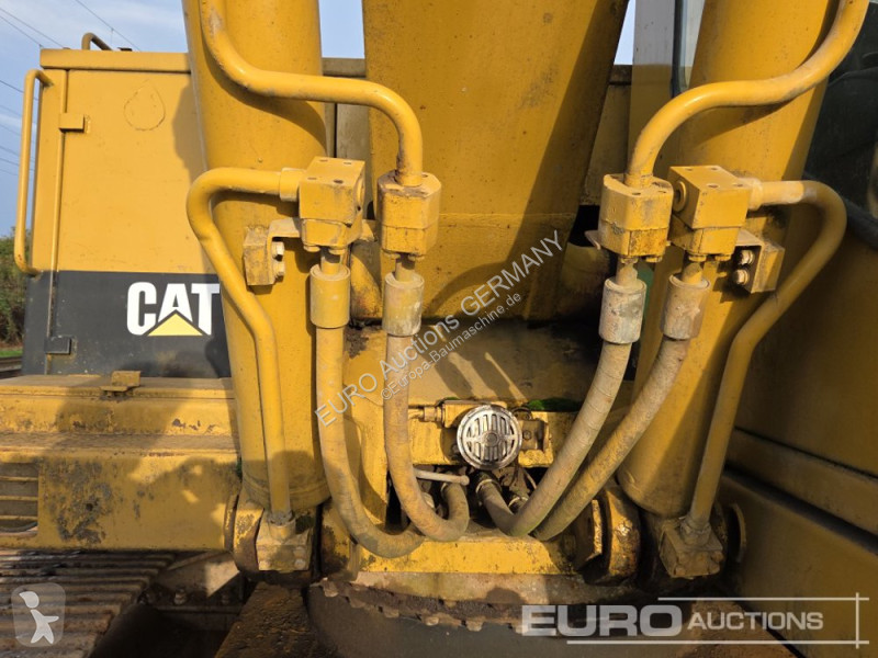 Багер Caterpillar 215C
