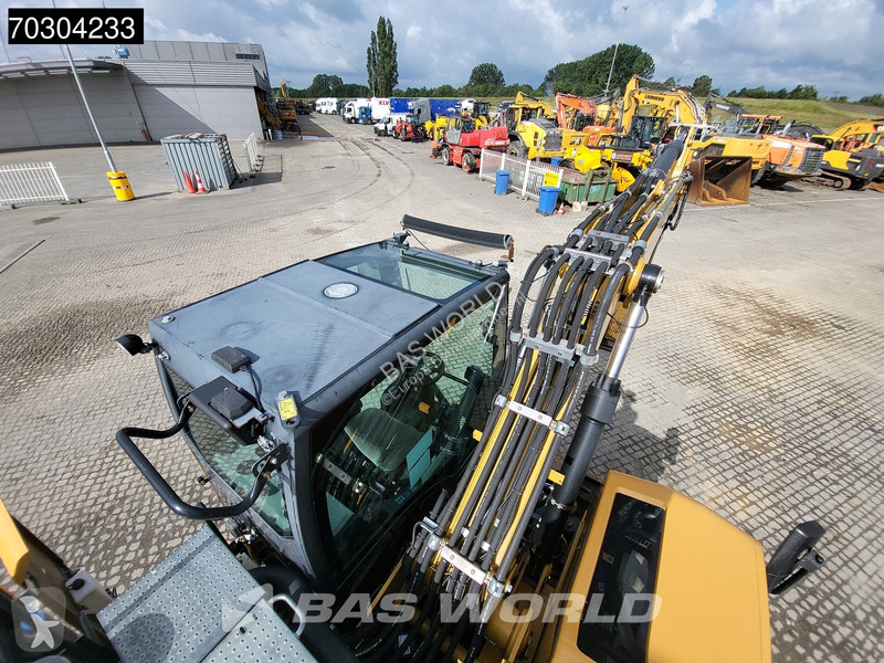 جرافة Caterpillar F F Outrigger + Blade